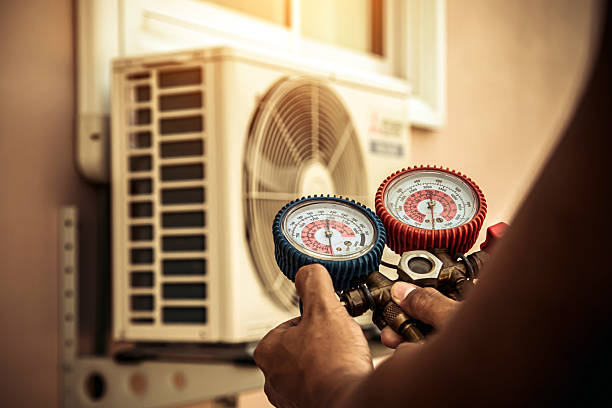 Professional Hvac Maintenance technician working in Intercession City, FL